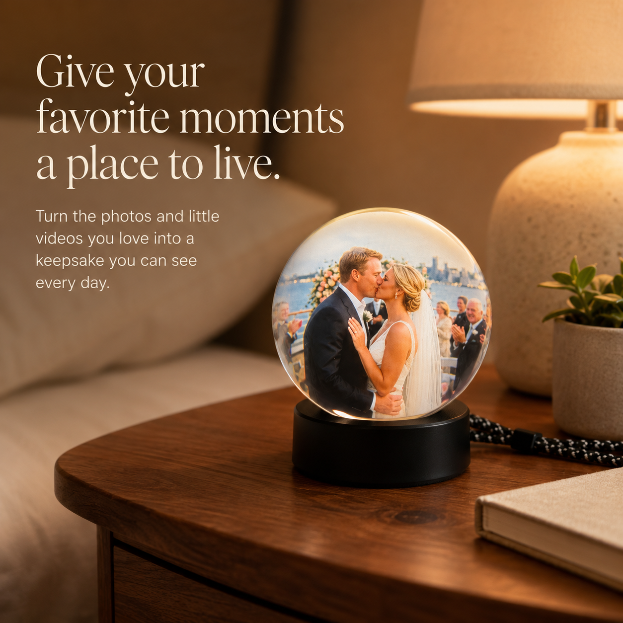 Keepsake Orb displaying a personal memory on a warm bedside table